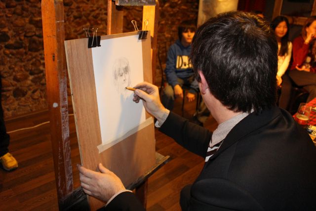 Un retrat o una caricatura a canvi d'un donatiu